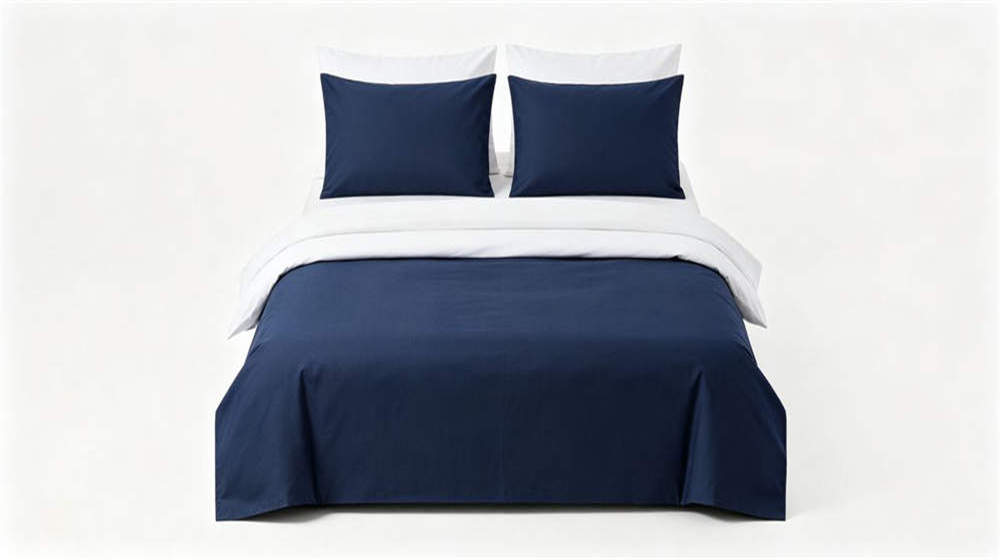 Bedding set flat lay navy white cotton polycotton sheet duvet cover pillowcase