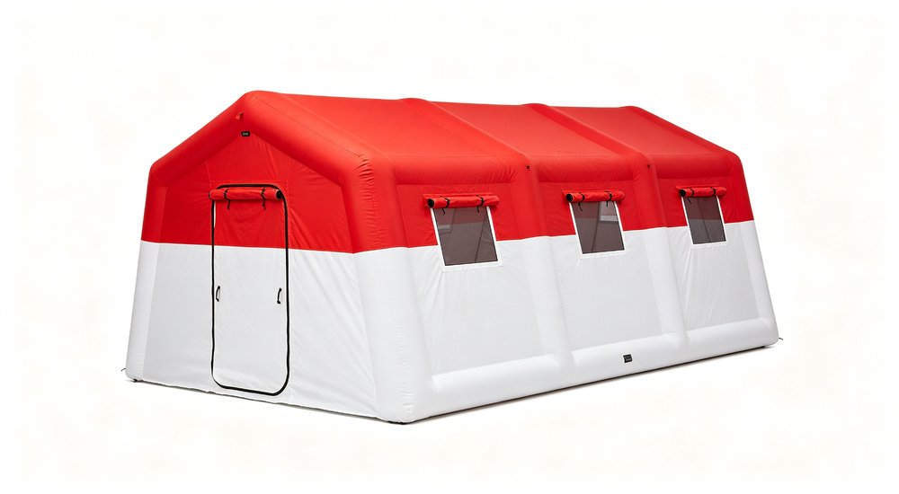 45 degree view of inflatable isolation tent on white background, red and white, product photography red and white inflatable emergency shelter for disaster relief operations