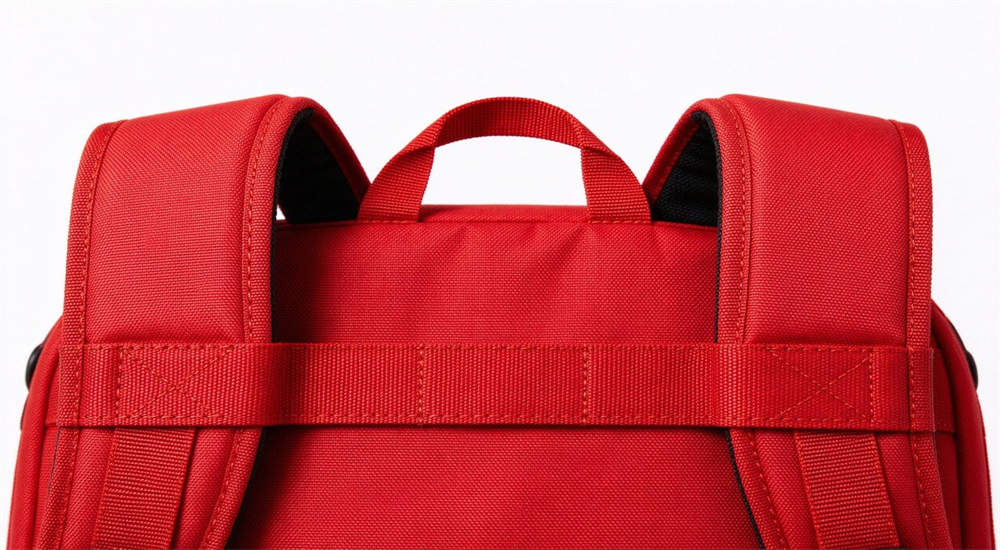 Side by side comparison of red and orange emergency backpacks on white background, selecting the right emergency kit bag for different scenarios