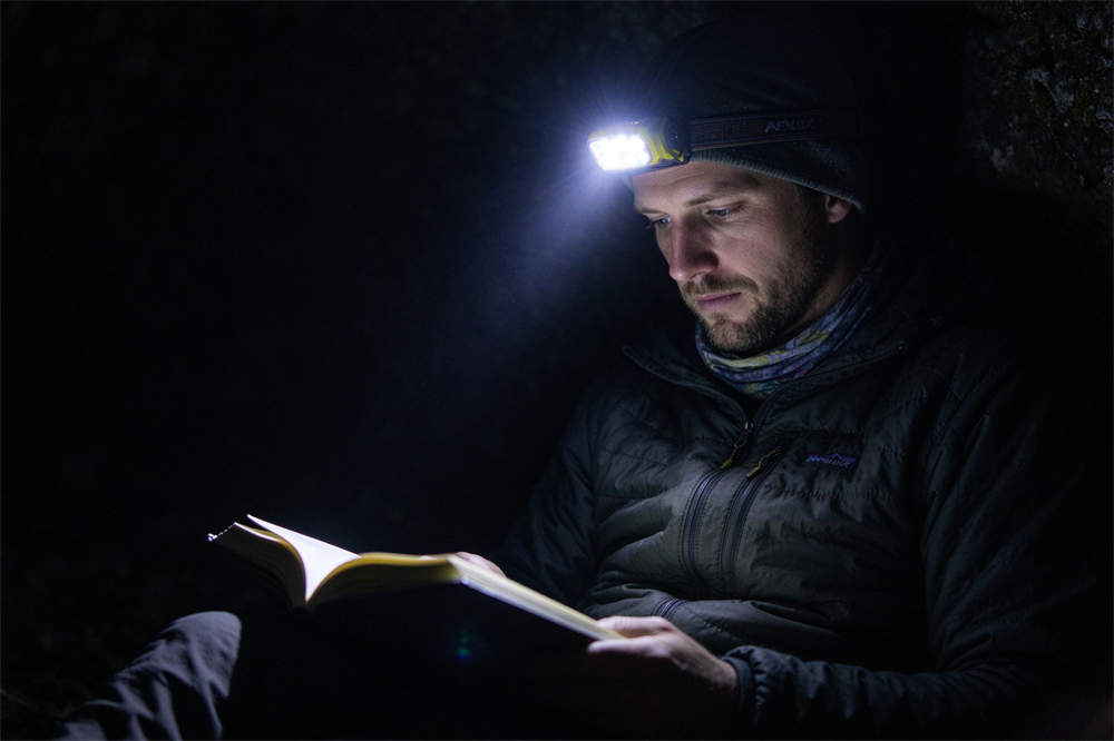 LED headlamp emergency lighting in dark room, go bag essentials for power outages and disaster preparedness hands free illumination